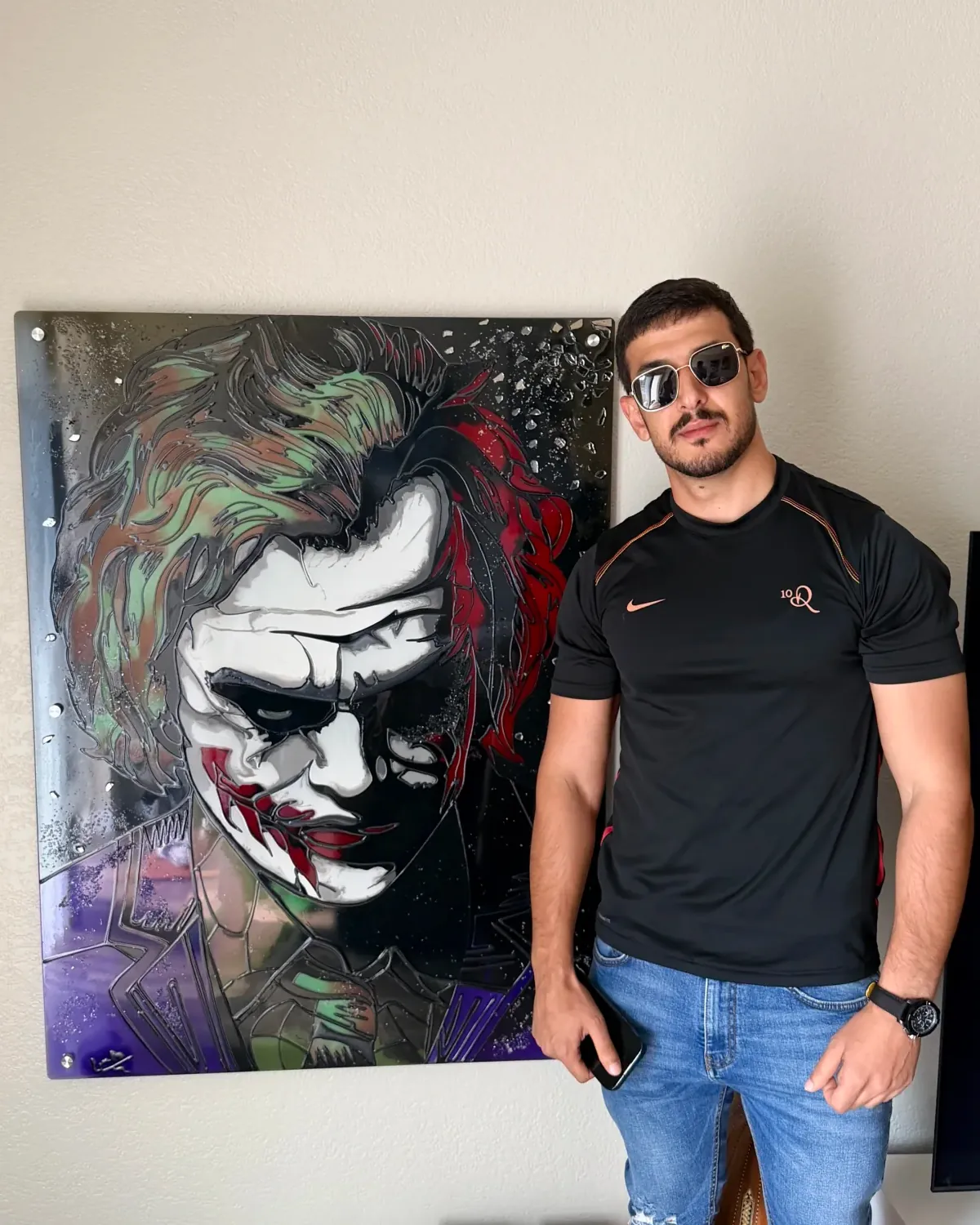 DADA standing beside The Joker